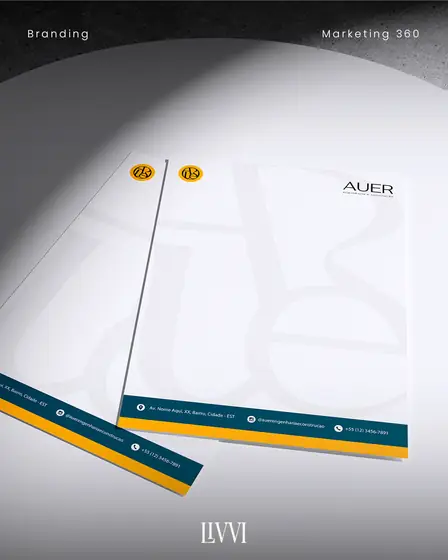 Papel timbrado da AUER Engenharia e Construção com marca d água do monograma